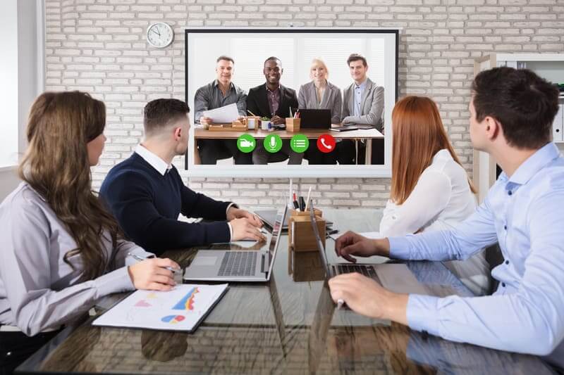 A successful video chat between IT experts and their clients in Red Deer, Canada. 