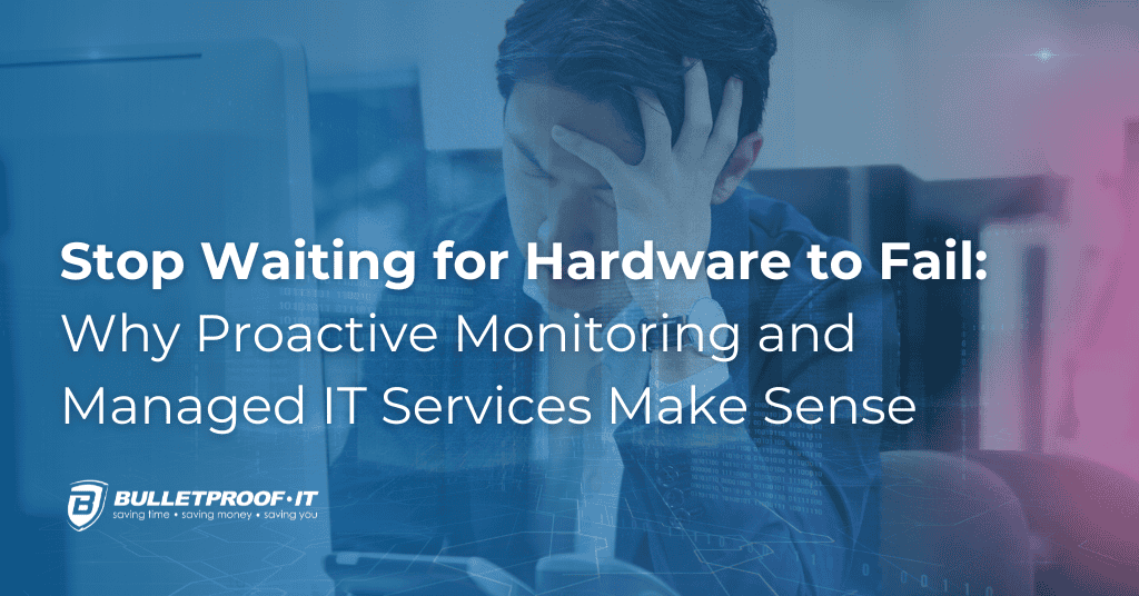 An image representing the subject matter of the article. The title is written out in white text "Stop Waiting for Hardware to Fail: Why Proactive Monitoring and Managed IT Services Make Sense" overlaid on top of a blue-hued photo of a man holding his head in his hand, looking frustrated as he sits at his computer.